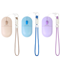 Clicker d'entraînement pour chien en forme de souris avec compartiment à friandises et boucle à ressort pour l'obéissance des chiots