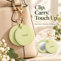 Miroir de maquillage rond en cuir PU avec logo personnalisé, poche simple face, couvercle rotatif et clip porte-clés pour sacs à main