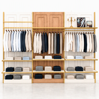 Portant à vêtements métallique robuste avec cadre noir, étagère en bois et tringle de suspension pour magasin de vêtements CE ETL Vente en gros