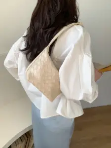 2024 primavera popolare donna moda PU Criss-cross tessuto sotto le ascelle secchio Design borsa a spalla hobo borsa per le donne all'ingrosso