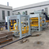 Machine de production de blocs de béton QT4-15 avec vibration à haute efficacité