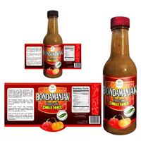 Étiquettes d'emballage alimentaire brillantes imperméables personnalisées pour bouteilles de sauce piquante imprimées en flexographie et autocollants pour bocaux de piment.