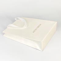 Sac en papier d'emballage de cadeau de bijoux de parfum de marque de distributeur sac en papier à provisions blanc personnalisé de boucle d'oreille avec votre propre logo