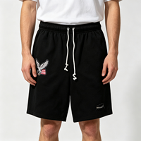 Shorts noirs déchirés avec broderie Aigle Américain et ourlet déchiré, pantalon décontracté streetwear d'été pour hommes