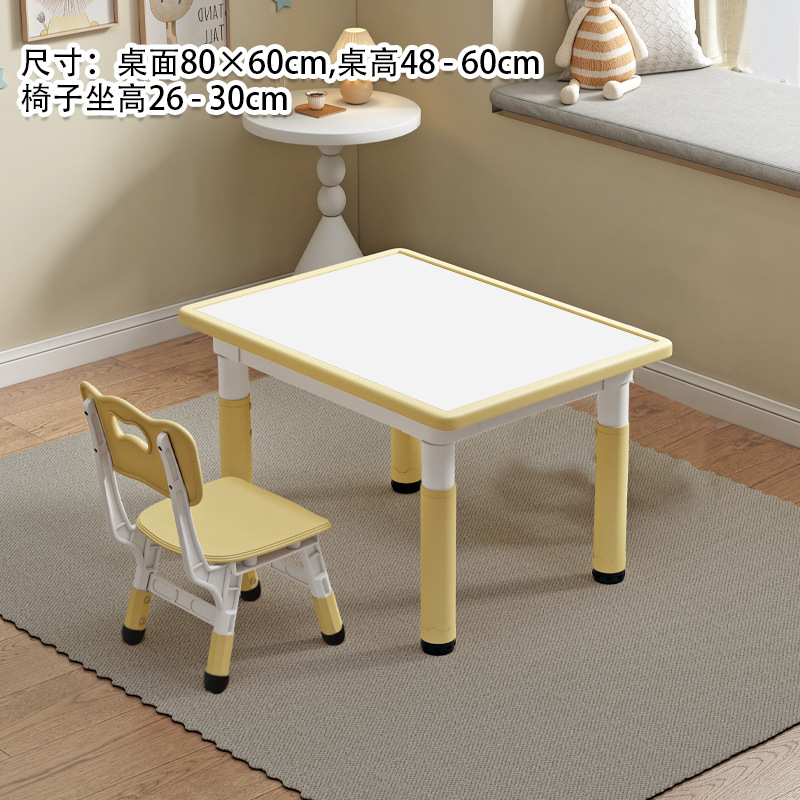Whiteboard, yellow table and chair