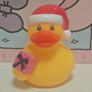 Custom Logo Baby Toys Christmas-Themed Squeeze-Sounding Squishy <b>Bath</b> Floating Toy Plastic Yellow Duck Unisex Wholesale - Product Image 1