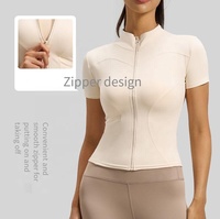 Veste de sport pour femme YiMo, respirante, légère, zippée, pour la course à pied, le yoga, la remise en forme, 100% polyester, manches courtes, col rond, coupe régulière