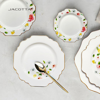 Luxe incrustation d’or os Chine ensembles de vaisselle Alien plate bord motif de fleurs plats en porcelaine dîner