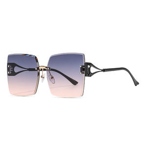 Nuevas gafas de sol sin montura de estilo europeo americano para mujer, lentes degradadas con protección UV400 y montura metálica - Product Image 3