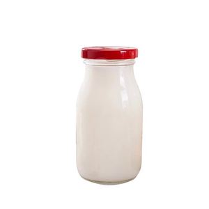 Fabriqué <span class=keywords><strong>En</strong></span> Chine élégant cadeau culture de noix de coco <span class=keywords><strong>en</strong></span> forme de bouteille <span class=keywords><strong>en</strong></span> verre de lait avec bouchon <span class=keywords><strong>en</strong></span> liège <span class=keywords><strong>en</strong></span> verre rond - Product Image 2