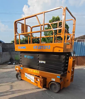 Plateforme élévatrice à ciseaux électrique XCMG GTJZ1212 d'occasion, hauteur de plateforme 12m, capacité 320kg, autopropulsée, pour entrepôt et construction