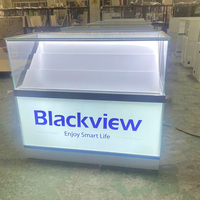 Maßgefertigte LADISPLAY Umweltfreundliche Wasserdichte Langlebige Metall-Handyschränke LED-Beleuchtung Glas-Vitrinen Ausstellungsschränke