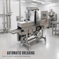 Machine industrielle à pain de mie pour la ligne de production de nuggets de poulet frit dans une usine de transformation d'aliments surgelés