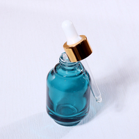 Ensemble d'emballages de luxe pour soins de la peau : flacons ronds en verre pour sérum avec compte-gouttes et pipette, logo personnalisable pour les soins du visage et des cheveux