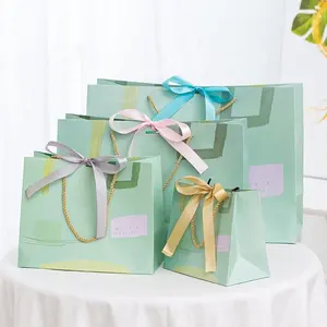 Wholesale Custom Branded Beautiful Small Jewelry Shopping Jewelry Wedding Gift Packaging Gift Paper Bags With Bow Tie