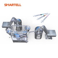 Machine d'assemblage automatique de seringues médicales à deux parties SMARTELL