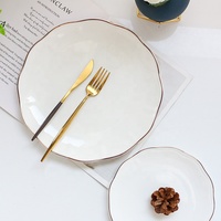 Jingchen Ensemble d'assiettes en porcelaine céramique blanche à bordure dorée de luxe Plats en porcelaine fine et assiettes écologiques quantité minimale de commande 100 pièces