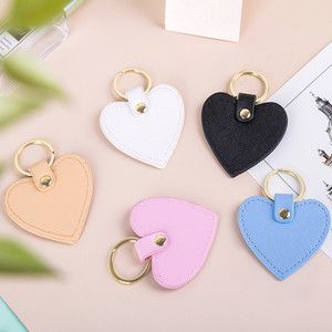 Venta caliente creativo personalizado lindo llavero en forma de corazón multicolor PU llavero de cuero creativo borla llaveros - Product Image 1