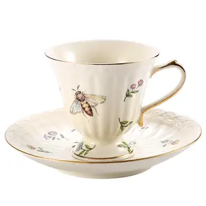 European insect patterned ceramic coffee cup and plate set