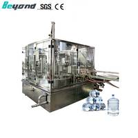 Machine à laver à triple action de 5 gallons 100 BPH avec buse de remplissage de 4 gallons pour usine de boissons