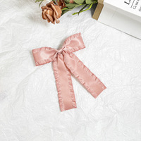 Accessoires pour femmes Pinces à cheveux avec nœud papillon et breloque en forme de cœur