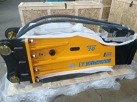 Marteau hydraulique SB70 pour excavatrices (16-21 tonnes) avec burin de 155 mm, accumulateur automatique, garantie 1 an, jaune, 1507 kg, emballage en bois