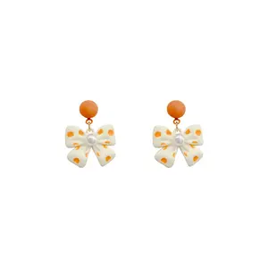 GT Jewelry polka dots yellow sweet stud pearl earrings retro bow knot earrings personality earrings for women
