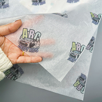 Vêtement de marque personnalisée vêtements en papier de soie impression couleur bouteille en verre emballage cadeau cartons en papier personnalisables