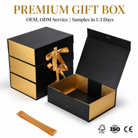 Boîte cadeau magnétique auto-élevante en carton rigide noir de luxe personnalisable avec lamination brillante et doublure en éponge pour parfums et artisanat
