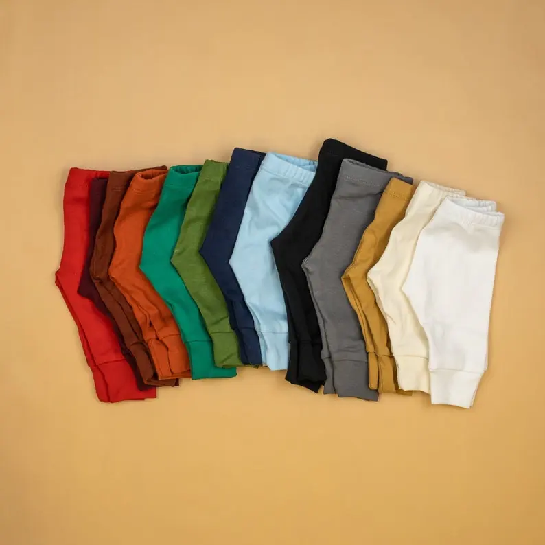 Personnalisable 100% coton bébé pantalon jambes élastiques chaud coton décontracté couleur unie bébé vêtements