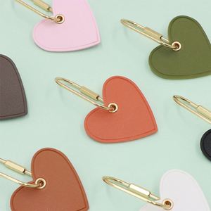HR Wholesale PU Leather Embossed Heart Leather Keychain Modern <b>Key</b> <b>Rings</b> Personalised Saffiano Leather Heart Keyring for Gifts - Product Image 1