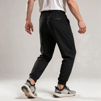 Pantalon de jogging fuselé léger en maille pour homme avec poche zippée pour le sport et le quotidien, personnalisable OEM