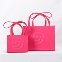 Sacs à main en cuir PU orange avec logo personnalisé en relief, sacs fourre-tout de luxe pour femmes, sacs à main de marque pour femmes fabriqués en usine