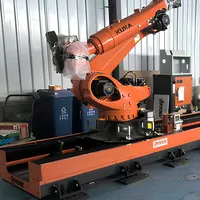 Solusi Lengan Robot KUKA Rel Panjang dengan Meja Putar Opsional