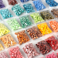 En gros Personnalisé 100 Grains 53 Couleur Octogonale Sac Particules D'étanchéité Multi Couleur Joint Cire Perles
