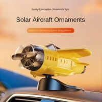 2025 décorations de Console de tableau de bord de voiture moderne ornement d'avion rotatif solaire assainisseurs d'air motif de bâton nouveau Design en plastique