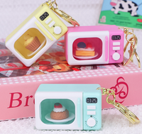 Porte-clés mini en plastique lumineux en forme de micro-ondes, design tendance pour cadeaux de fête, cadeaux du Nouvel An et sacs pour femmes