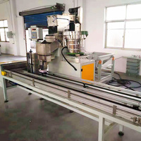 Machine intelligente de conditionnement de clous en fer