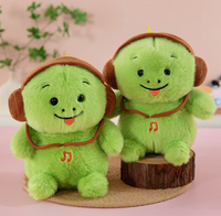 La petite tortue écoutant de la musique, adorable peluche tortue avec écouteurs, un coussin doux et apaisant