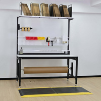 Système de table d'emballage modulaire avec porte-rouleau et distributeur de film à bulles pour un flux de travail optimisé de la station d'expédition