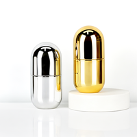 Flacon en plastique en forme de capsule électroplaqué, vide, finition or/argent, pour emballage de suppléments et de vitamines en capsules