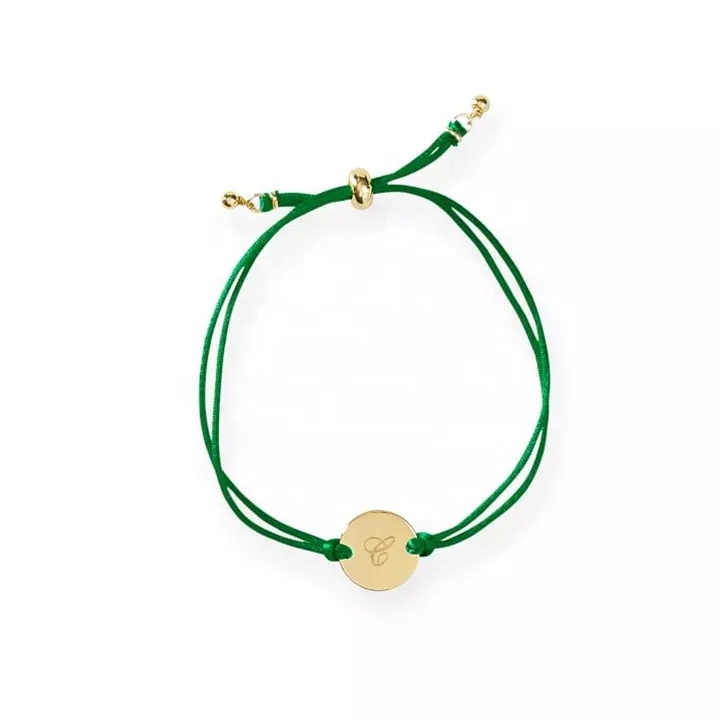 Bracciale personalizzato con iniziale timbrata a mano. Bracciale