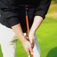 SwingPerfect - Entrenador de Golf en Forma de T para Putt y Chipping, Soporte de Fibra de Carbono para el Brazo Superior, Ayuda Estable para el Control del Codo en Forma de Triángulo, 49 cm