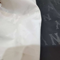 Tissu de doublure en pongé gaufré sergé 100 % polyester antistatique, idéal pour les sacs d'extérieur, les bagages et les vêtements