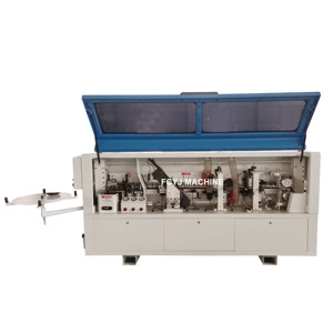 Machine à plaquer les chants en PVC pour le travail du bois utilisée pour améliorer la surface du bois Les composants du noyau incluent le moteur - Product Image 1