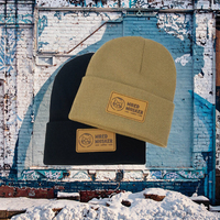 Bonnet d'hiver unisexe de créateur en acrylique doux, style streetwear premium, pour sports d'hiver, avec logo patch en cuir personnalisé à motif dessin animé