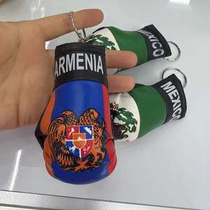 2024 simulación <span class=keywords><strong>de</strong></span> logotipo personalizado profesional barato 5,5*10cm Bandera Nacional PU guantes <span class=keywords><strong>de</strong></span> boxeo <span class=keywords><strong>de</strong></span> cuero llavero para colgante <span class=keywords><strong>de</strong></span> espejo <span class=keywords><strong>de</strong></span> coche - Product Image 3