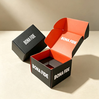 Boîte d'expédition personnalisée avec logo, intérieur noir et orange, en carton ondulé, pour les entreprises de vente en ligne de vêtements et de produits de beauté