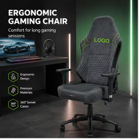 Chaise de jeu ergonomique noire avec siège large, coussins en mousse haute densité, tissu moelleux pour la maison et le bureau