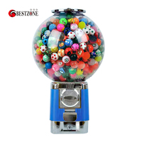 Distributeur de bonbons et de balles rebondissantes à monnayeur, modèle tête ronde